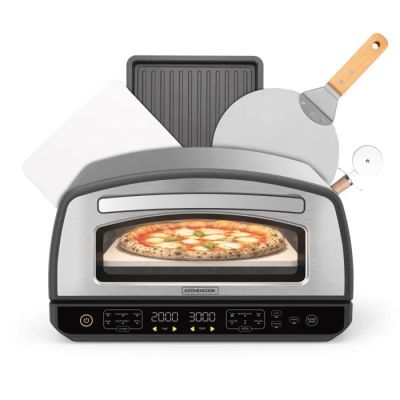 a pizza oven with a pizza in it and a pizza cutter