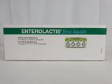 a white box with a green and white label sitting on top of a table