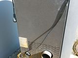 a small refrigerator that is sitting on a pallet