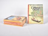 une pile de livres posés les uns à côté des autres sur une table