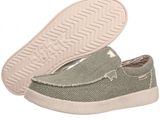 a close up of a pair of gray shoes with a white sole