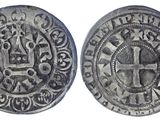 une pièce d'argent avec une croix au recto et une croix au verso