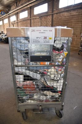 a cart with a lot of electronics on it in a warehouse