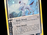 une photo d'une carte sur laquelle figure l'image d'un dragon blanc