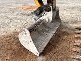 a bulldozer that is sitting in the dirt