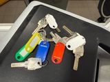 a bunch of keys that are sitting on a table