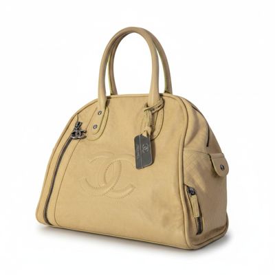 chanel beige leather handbag with cc logo