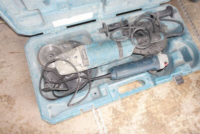 a tool in a case that is sitting on the floor