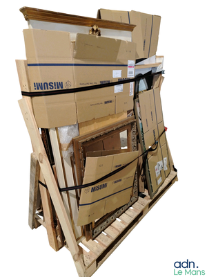a large stack of boxes on a pallet on a white background