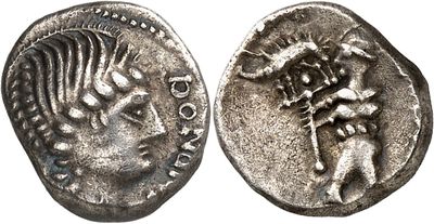 a silver coin with a head of a man and a woman on it