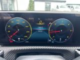 the dashboard of a car with a digital display showing the speed of the car
