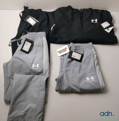 two pairs of men ' s under armour sweatpantss and a pair of under armour sweatpantss