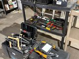 many tools on a shelf in a garage