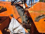 a tractor that is sitting in the dirt