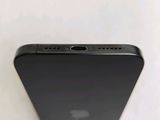 the back of a black iphone with a camera attached to the back of it
