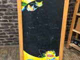a chalk board with a picture of a bird on it