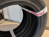 an image of a tire with a tape around the rim