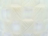 a close up of a glass vase with a pattern on it