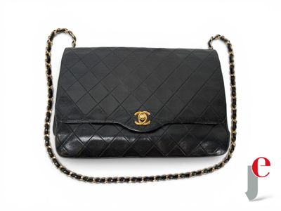 a chanel black quilted leather shoulder bag with gold hardware