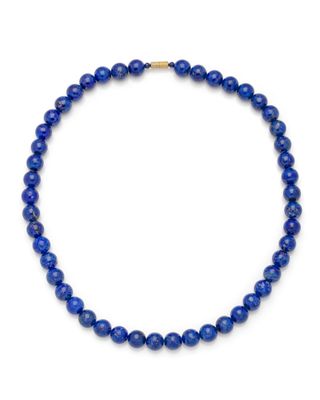 a lapis beaded necklace with a gold clasp