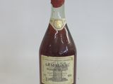 an image of a bottle of wine sitting on top of a table