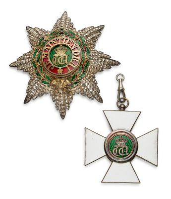 une image représentant une médaille et une croix sur fond blanc