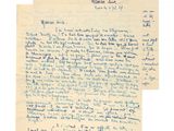 une lettre manuscrite d'un homme qui tient une feuille de papier