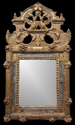 an image of a gold framed mirror on a black background