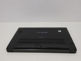the laptop is sitting on a white surface with a white background