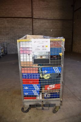 a cart with a lot of boxes on it in a warehouse