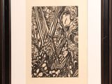 a black and white drawing of a woman in a garden
