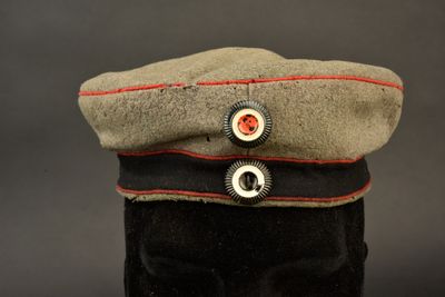an image of a military hat with buttons on it