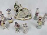 many figurines that are sitting on a table