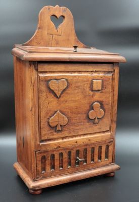 an image of a wooden box with hearts and spades on it
