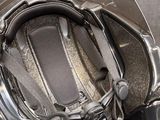 a helmet that is sitting on top of a motorcycle