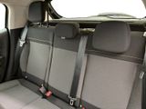 four seats in the back of a car that are empty
