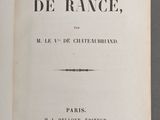 an open book with a black and white title on it