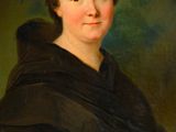 portrait of a woman in a black dress with a black shawl