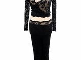 a mannequin dress with a black lace top and skirt