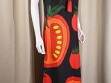 an image of a mannequin wearing a dress with tomatoes on it