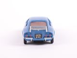a blue toy car that is sitting on a white surface
