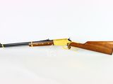 a rifle with a wooden barrel on a white background