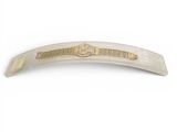 a silver and gold hair clip on a white background