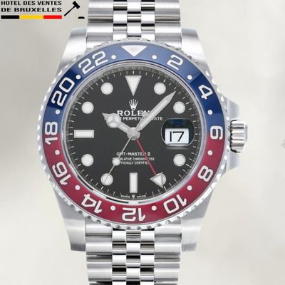 rolex watch with red, white and blue bezeled bezel
