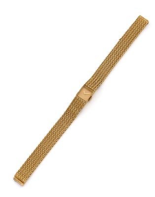 a gold mesh bracelet with a clasp on a white background