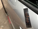 a sticker on the door of a car that says auto