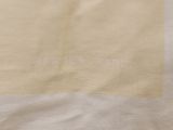 a close up of a t - shirt that has a picture of a cat on it