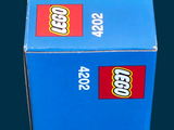 a box of legos sitting on top of a table