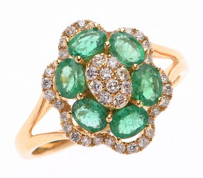 BAGUE en or jaune 750 °/°° en forme de fleur ornée de six ém…