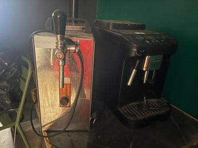 a coffee machine that is sitting on a table